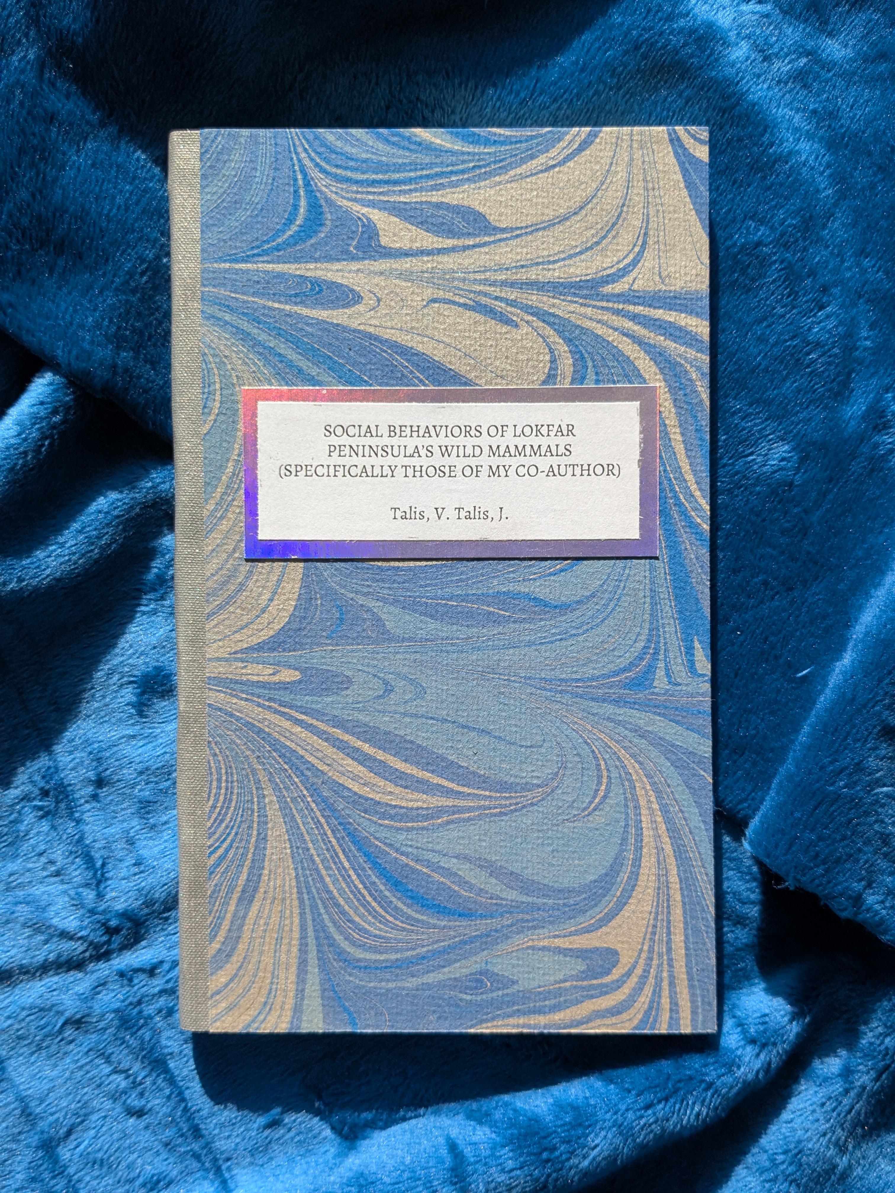 photo of fanbind 'Talis, V. Talis, J. “Social Behaviors of Lokfar Peninsula’s Wild Mammals (Specifically Those of my Co-Author)'